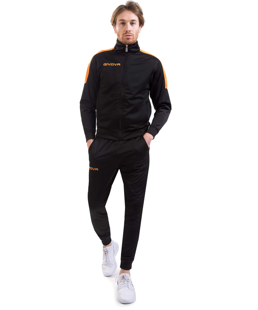 Tuta Givova Revolution Fluo nera con inserti arancio fluo ad alta visibilità Givova Tute Planet Sport Italia